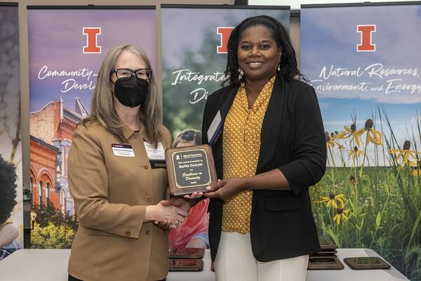 Woman receiving an award